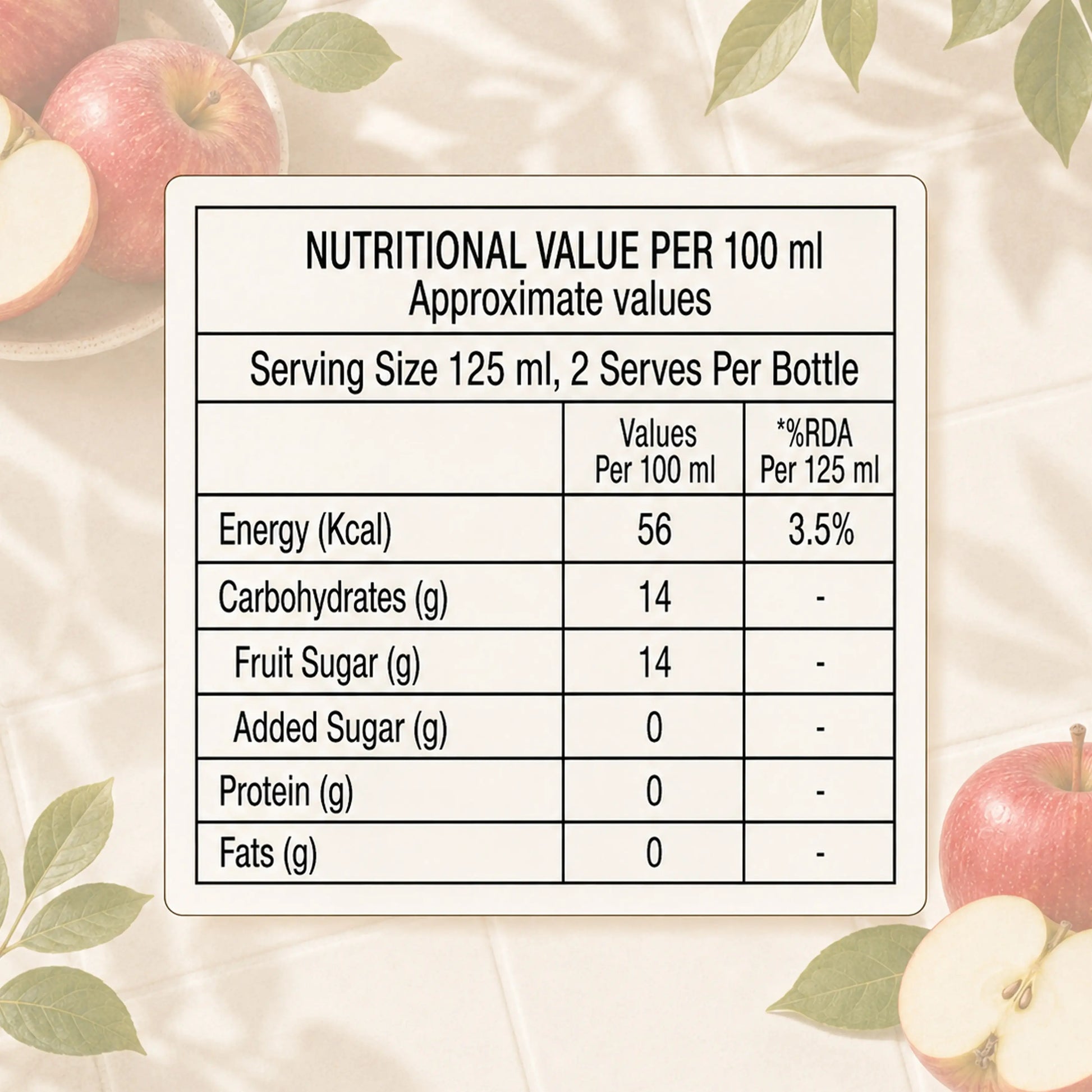 Frut Jus Apple juice poured into a glass - 100% real fruit, no added sugar