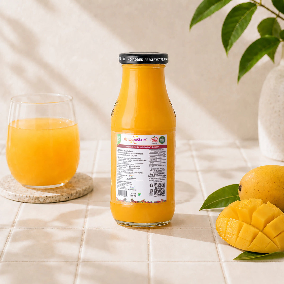 Frut Jus Mango juice bottle label close-up