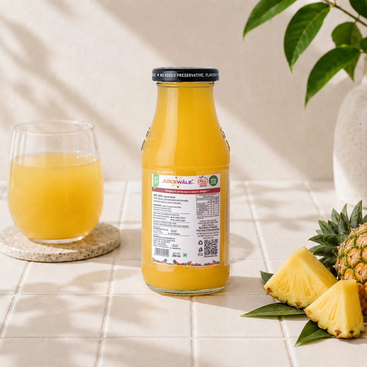Frut Jus Pineapple juice bottle label close-up